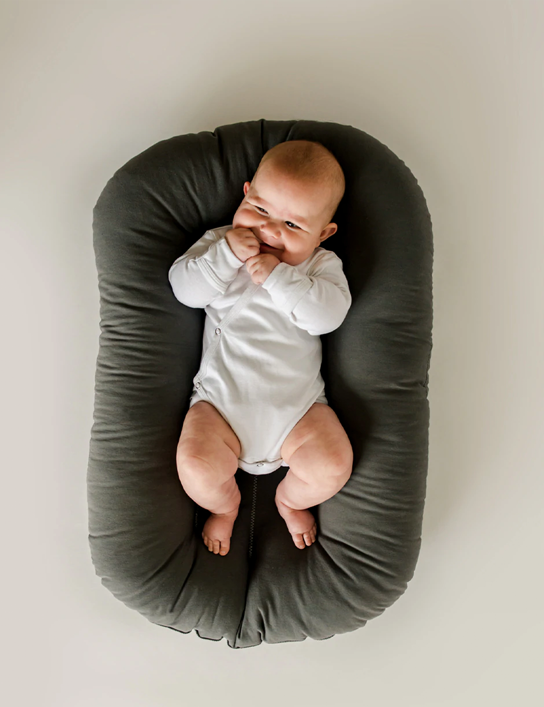 Baby sleeping hot sale in snuggle me